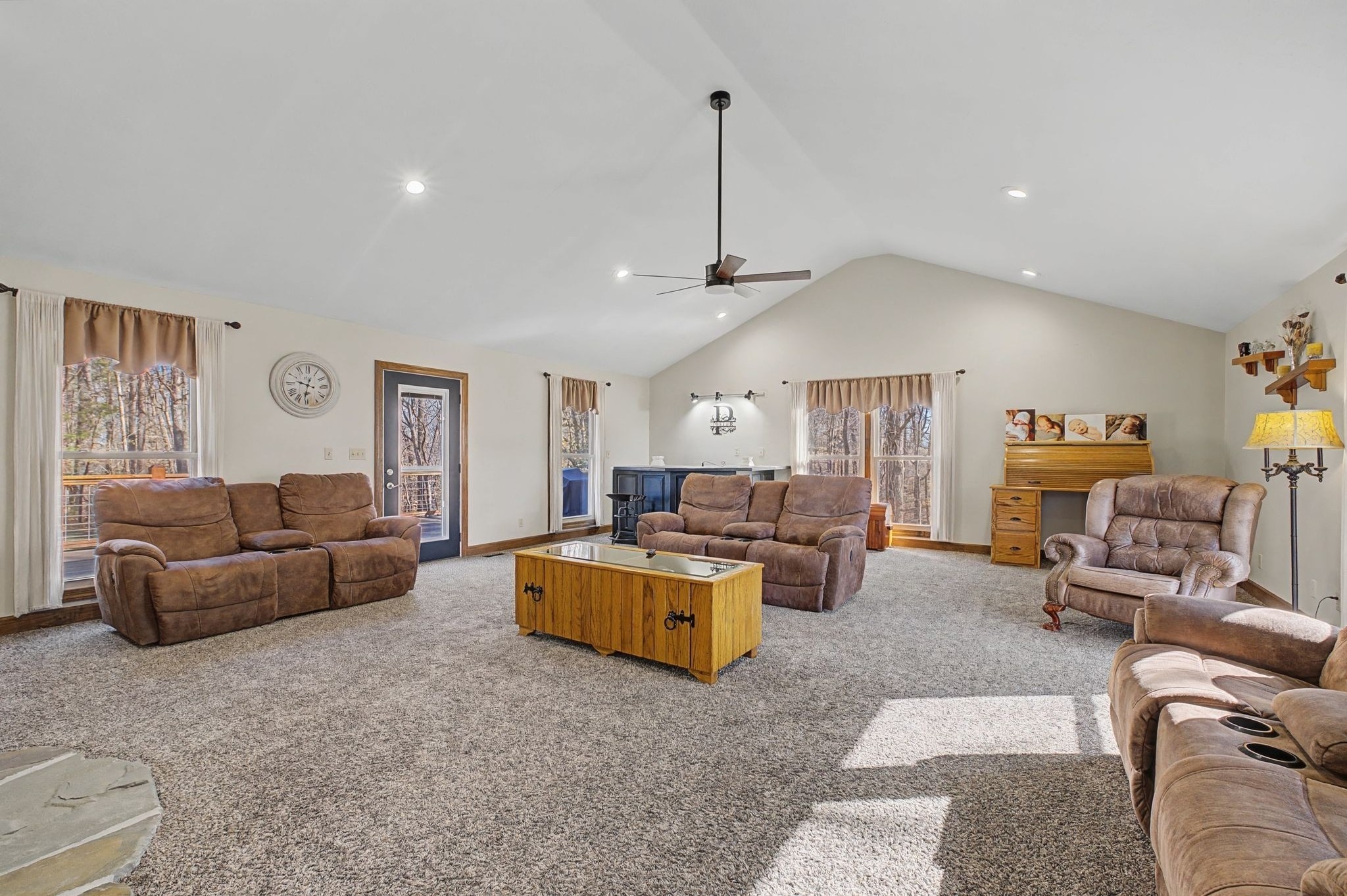 1231 Abiff Road Bon Aqua, TN 37025 - Photo 10 of 60 a living room with furniture kitchen view and a chandelier