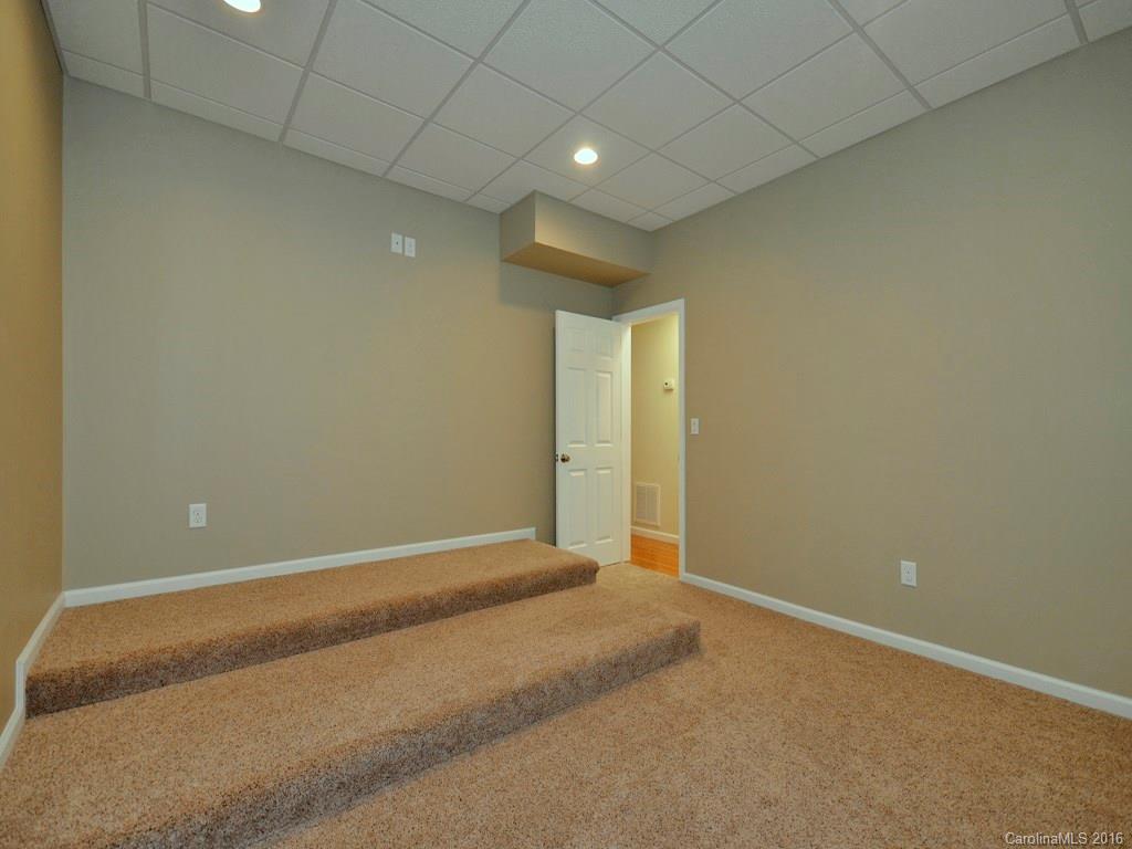 668 Mouzon Road Waynesville, NC 28785 - Photo 18 of 24 a view of an empty room