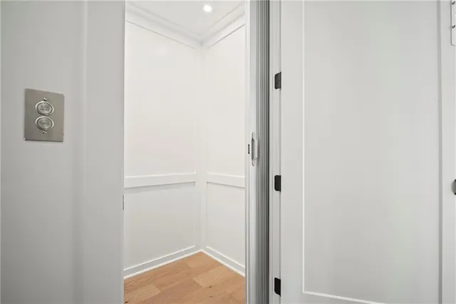 a living room with furniture ceiling fan and a rug