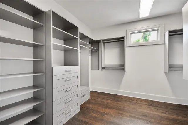 a bathroom with a sink and vanity
