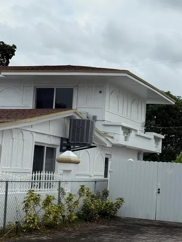 a view of residential houses with city view
