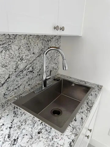 a bathroom with a sink and a toilet