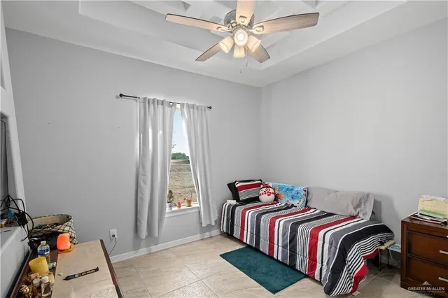a bathroom with a sink vanity and toilet