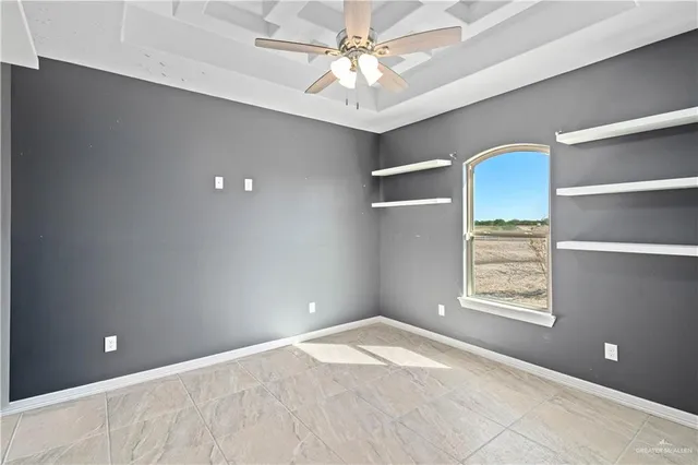 a kitchen with a stove and a sink