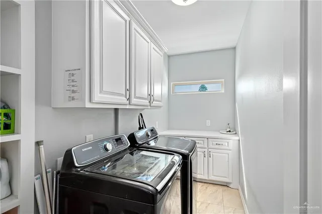 a view of a house with a snow in the yard