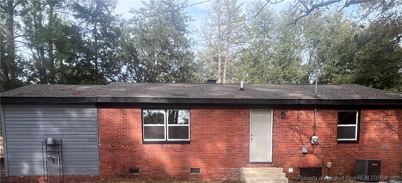 302 Keith Avenue Raeford, NC 28376 - Photo 14 of 14 a view of brick house with a large window