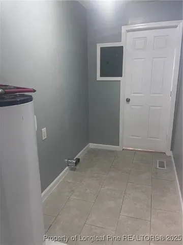 a kitchen with granite countertop cabinets and steel stainless steel appliances