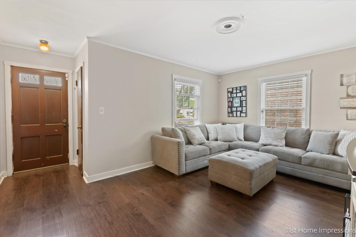 2425 South 13th Avenue Broadview, IL 60155 - Photo 5 of 13 a living room with furniture and a window