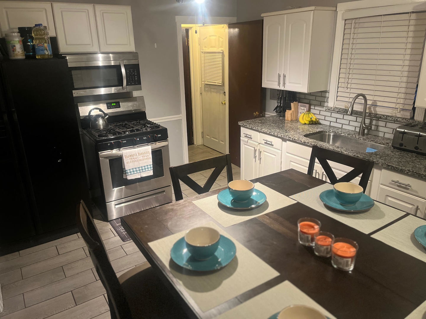 2425 South 13th Avenue Broadview, IL 60155 - Photo 7 of 13 a kitchen with a table and chairs in it