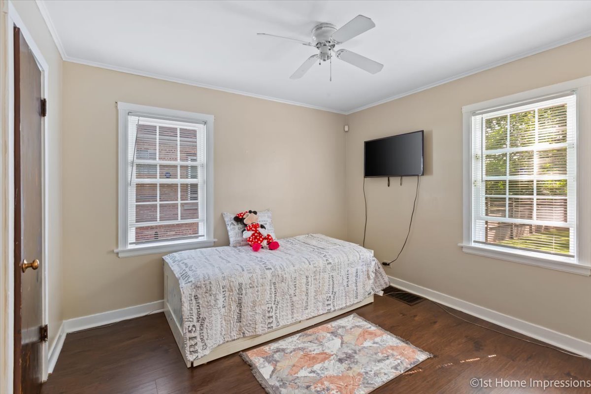 2425 South 13th Avenue Broadview, IL 60155 - Photo 10 of 13 a bedroom with bed and a window
