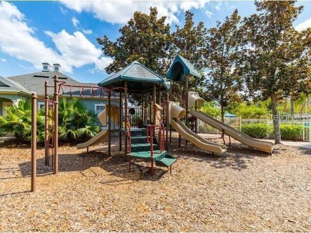 12861 Madison Pointe Circle, Unit 101 Orlando, FL 32821 - Photo 30 of 30 a view of outdoor space yard and patio