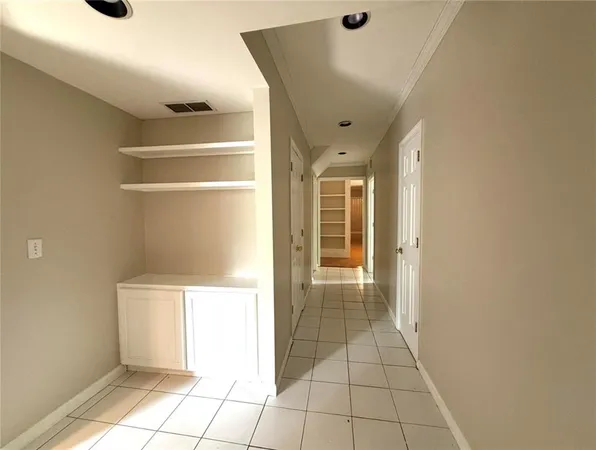 a view of an empty room and window