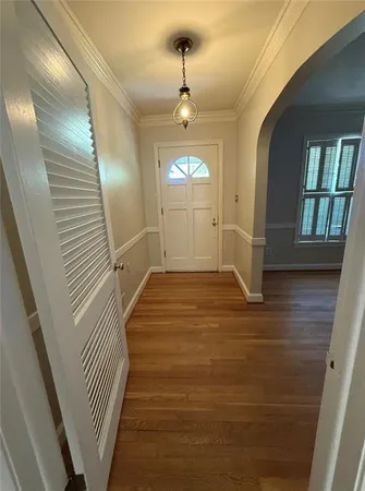 a view of entryway with wooden floor