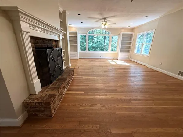 a view of livingroom with furniture window and wooden floor