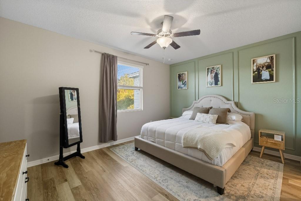 13664 Northwest 9th Road Newberry, FL 32669 - Photo 12 of 33 a bedroom with a bed and a window