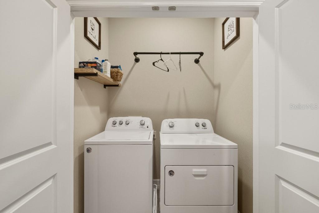 13664 Northwest 9th Road Newberry, FL 32669 - Photo 20 of 33 a utility room with dryer and washer