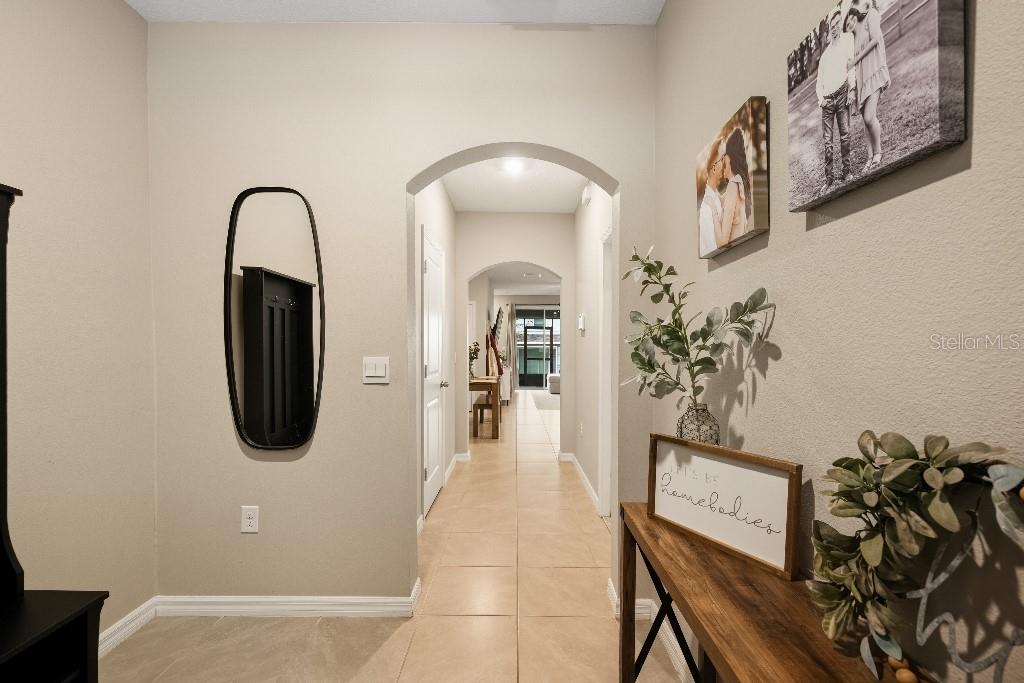 13664 Northwest 9th Road Newberry, FL 32669 - Photo 2 of 33 a view of a hallway with seating area