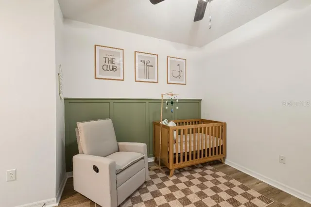 a bedroom with furniture and a window