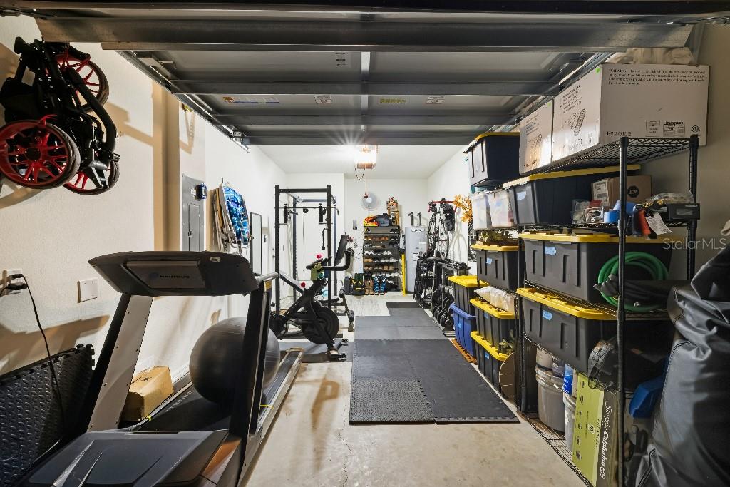 13664 Northwest 9th Road Newberry, FL 32669 - Photo 31 of 33 a view of a room with gym equipment