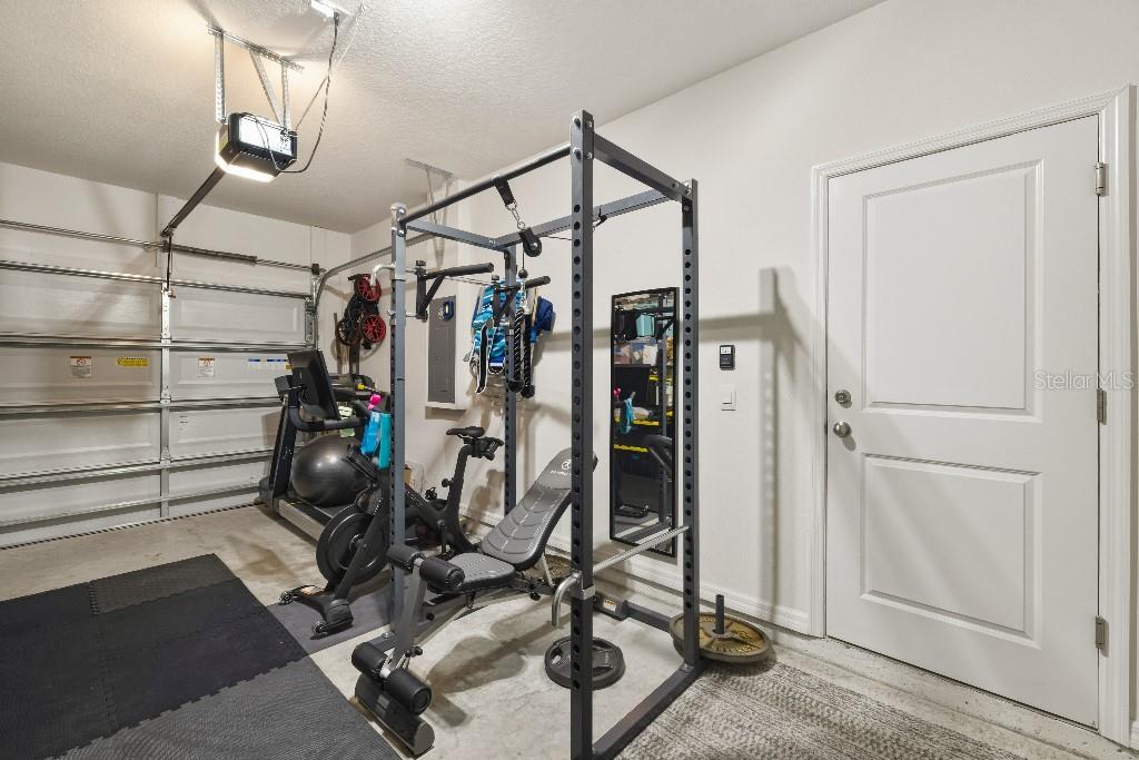 13664 Northwest 9th Road Newberry, FL 32669 - Photo 33 of 33 a view of a room with gym equipment