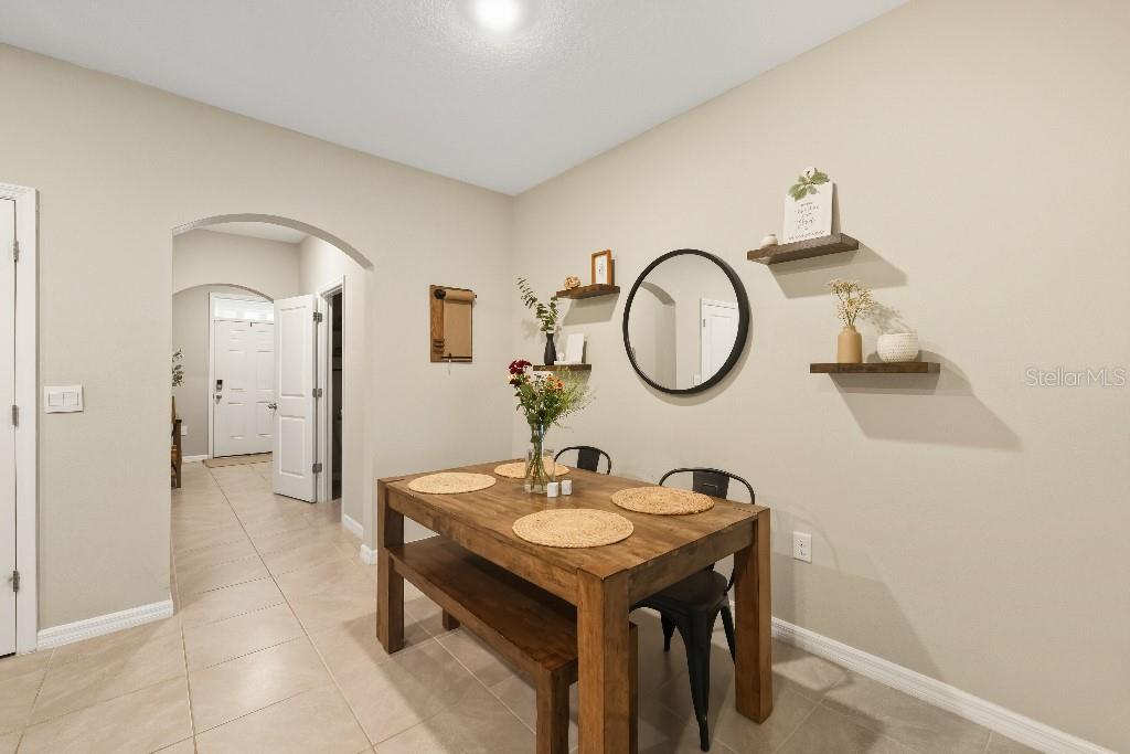 13664 Northwest 9th Road Newberry, FL 32669 - Photo 7 of 33 a bathroom with a sink and a mirror