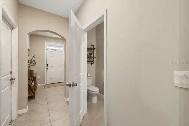 a view of a bathroom from a hallway