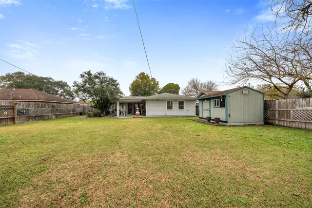 a front view of house with yard and seating