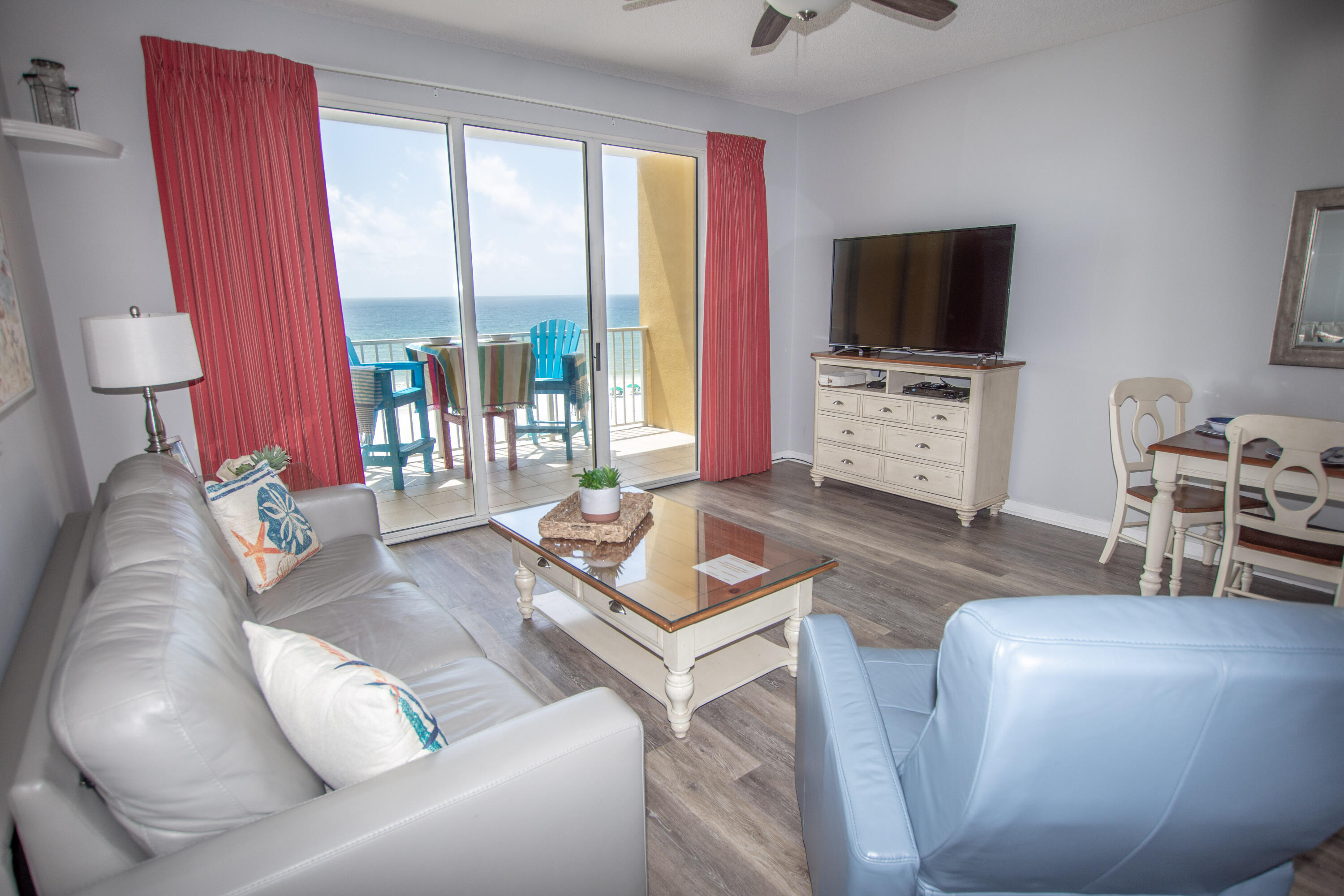 376 Santa Rosa Boulevard, Unit 507 Fort Walton Beach, FL 32548 - Photo 12 of 32 a living room with furniture and a flat screen tv