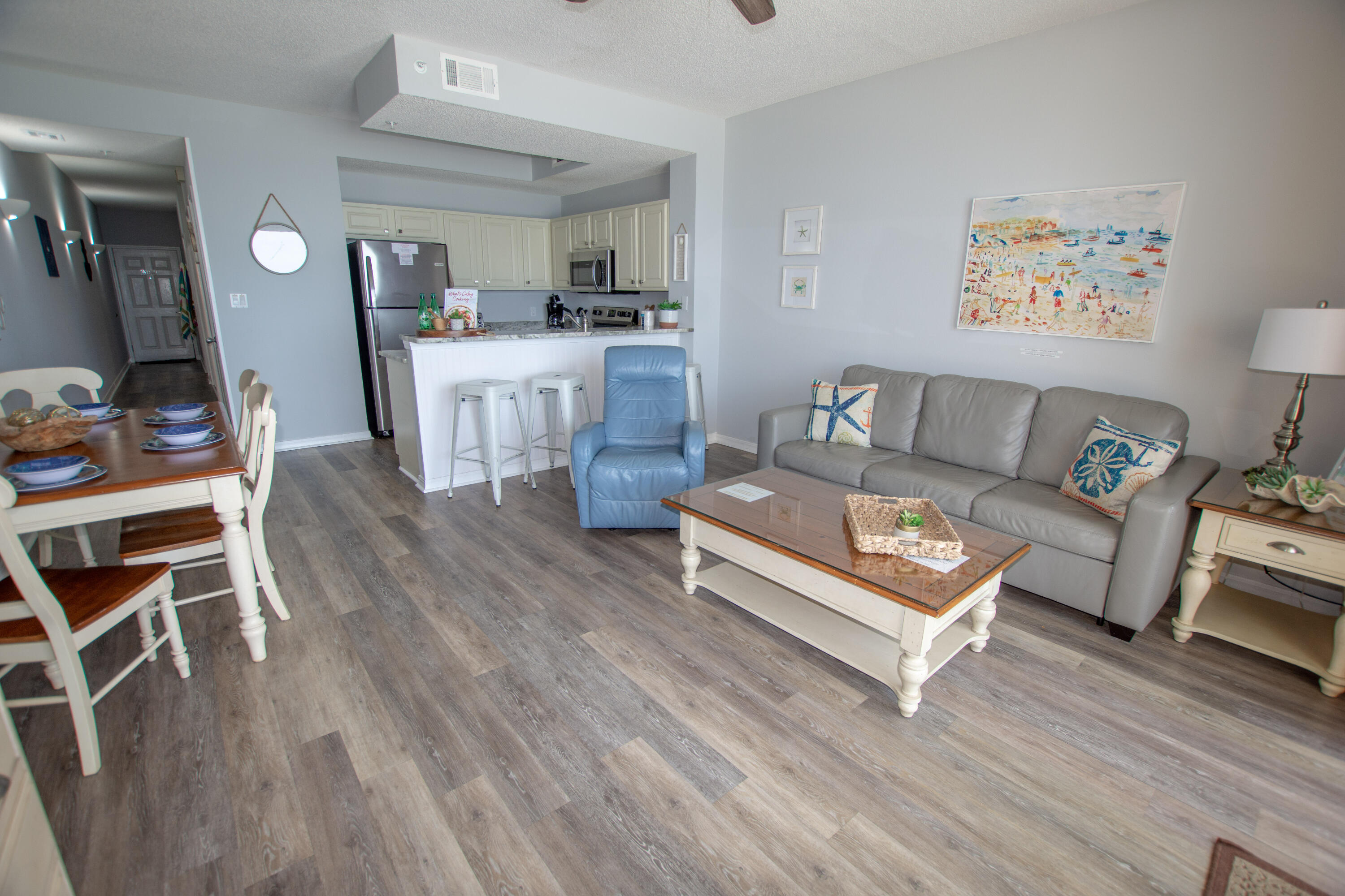 376 Santa Rosa Boulevard, Unit 507 Fort Walton Beach, FL 32548 - Photo 13 of 32 a living room with furniture and a wooden floor