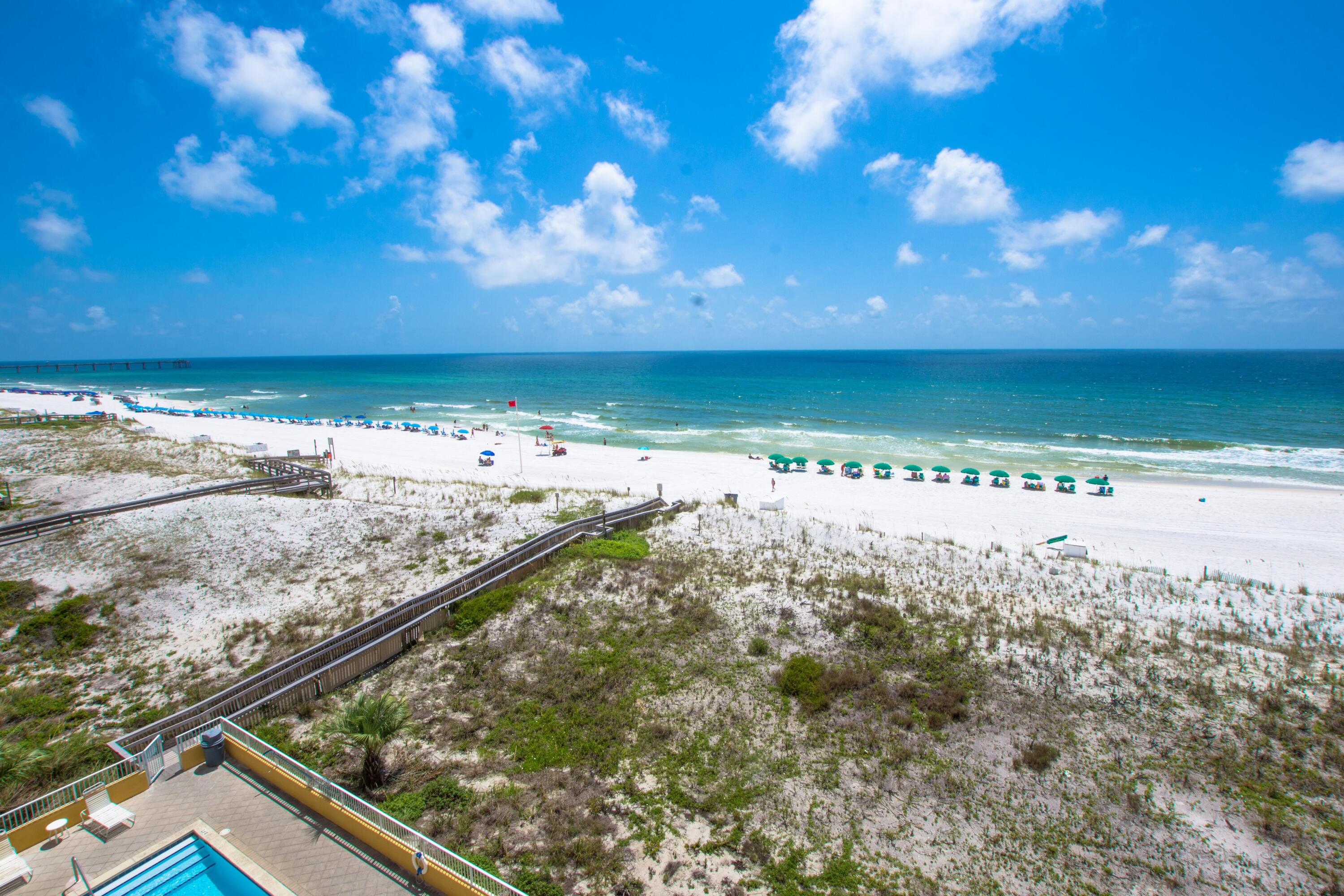 376 Santa Rosa Boulevard, Unit 507 Fort Walton Beach, FL 32548 - Photo 7 of 32 a view of a lake from a balcony
