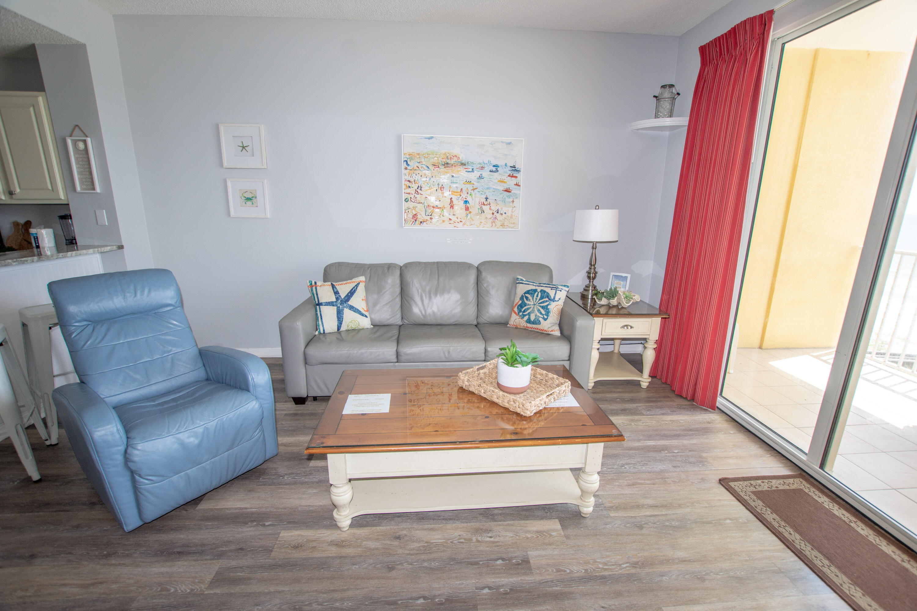 376 Santa Rosa Boulevard, Unit 507 Fort Walton Beach, FL 32548 - Photo 9 of 32 a living room with furniture and a floor to ceiling window