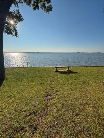 a view of a lake with a house