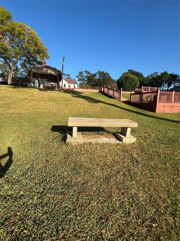 a view of a swimming pool with an ocean view