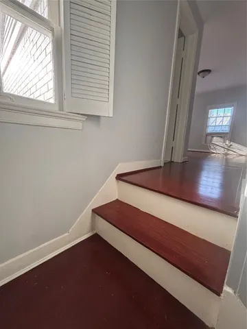 a view of sitting area with furniture and window