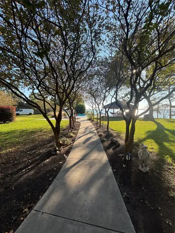 a view of swimming pool with an outdoor space and seating area