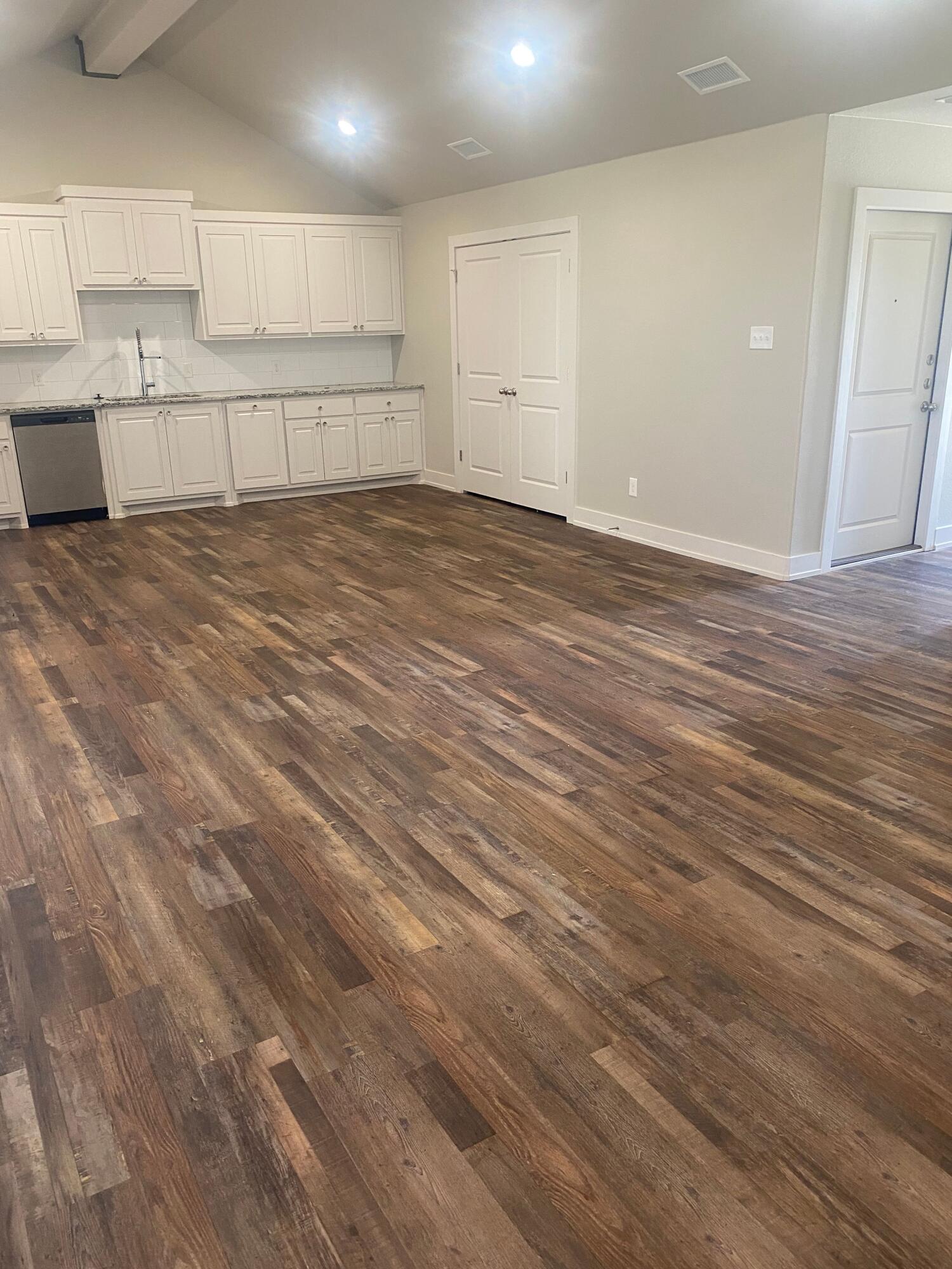 1609 Avenue O, Unit B Shallowater, TX 79363 - Photo 5 of 12 a view of a kitchen with a sink