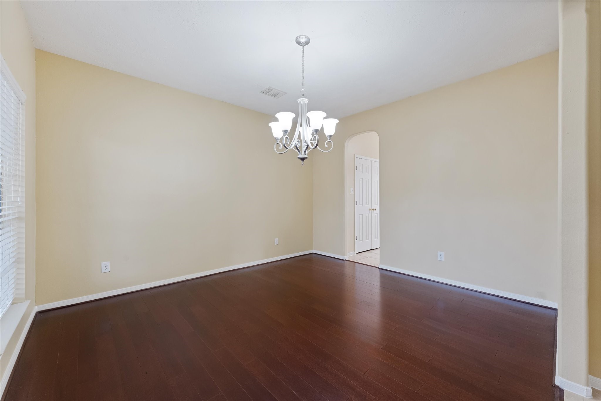 23806 Spring Way Drive Spring, TX 77373 - Photo 11 of 44 a view of a chandelier in big room and wooden floor