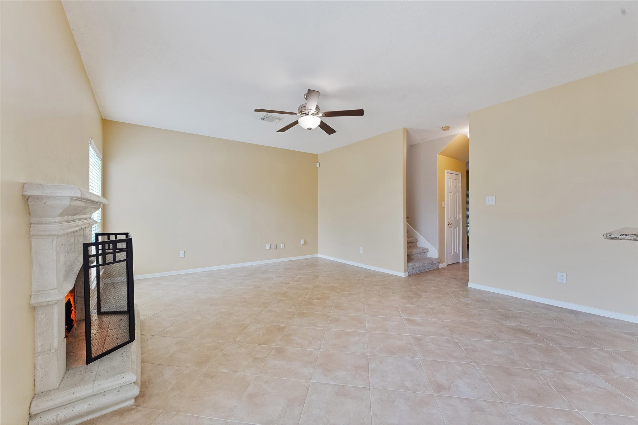 23806 Spring Way Drive Spring, TX 77373 - Photo 18 of 44 a view of an empty room with a ceiling fan