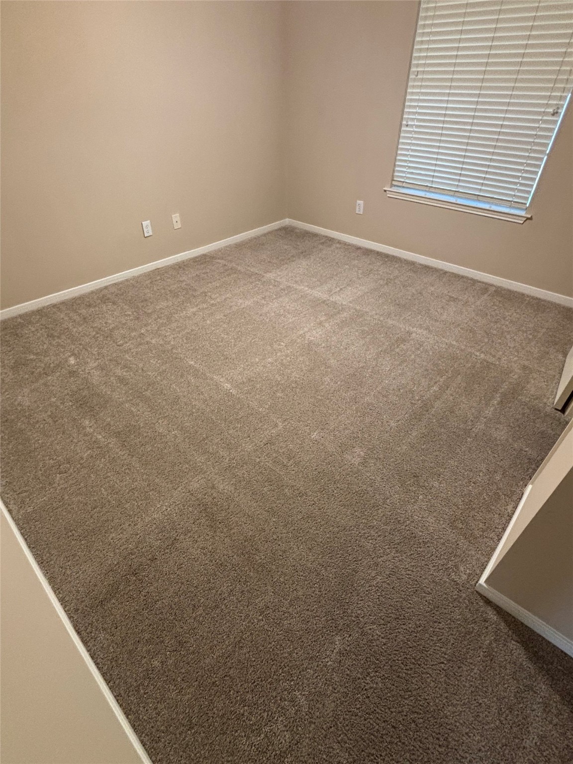 23806 Spring Way Drive Spring, TX 77373 - Photo 29 of 44 a view of an empty room with a window