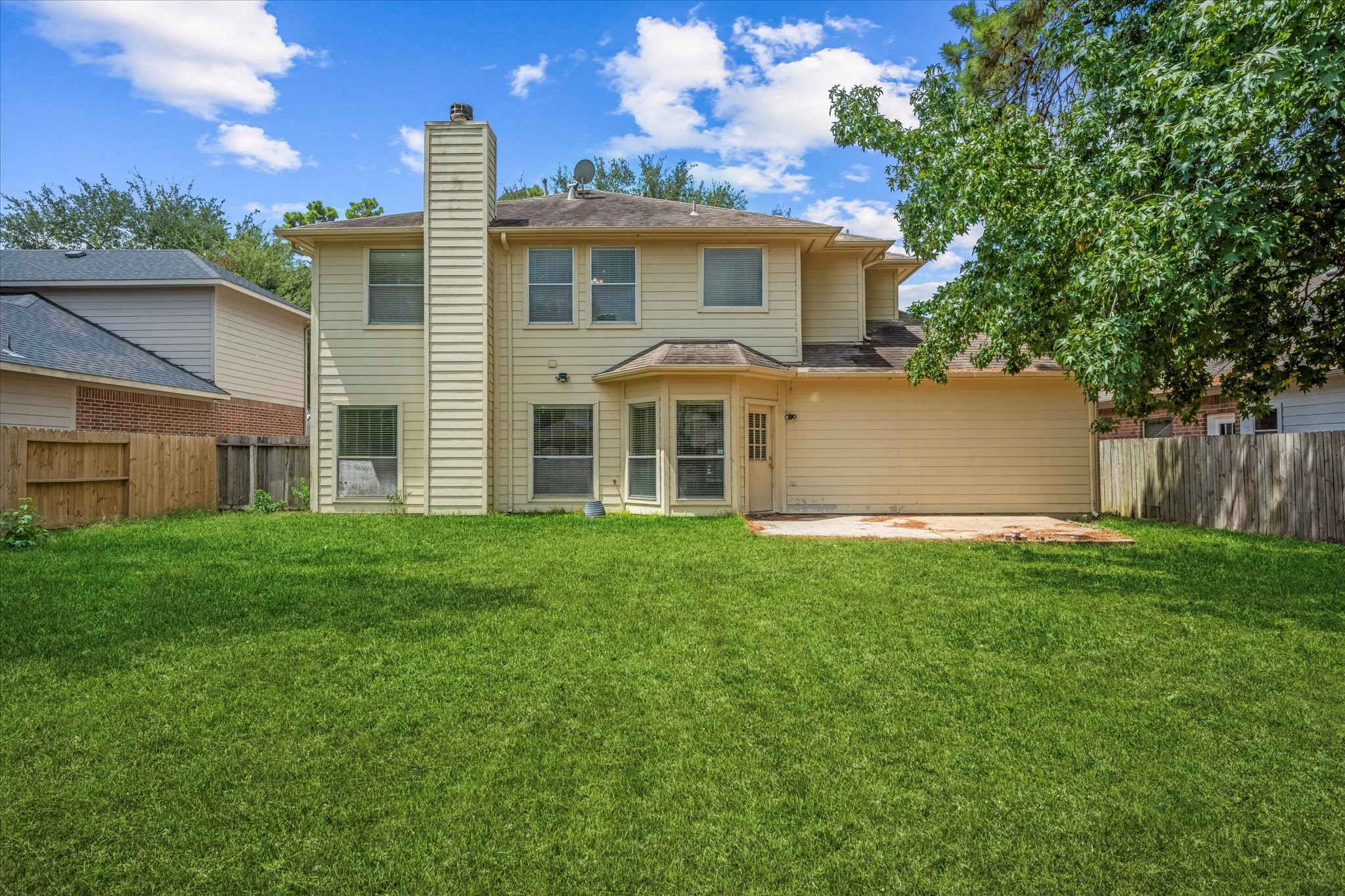 23806 Spring Way Drive Spring, TX 77373 - Photo 36 of 44 a view of a house with a backyard