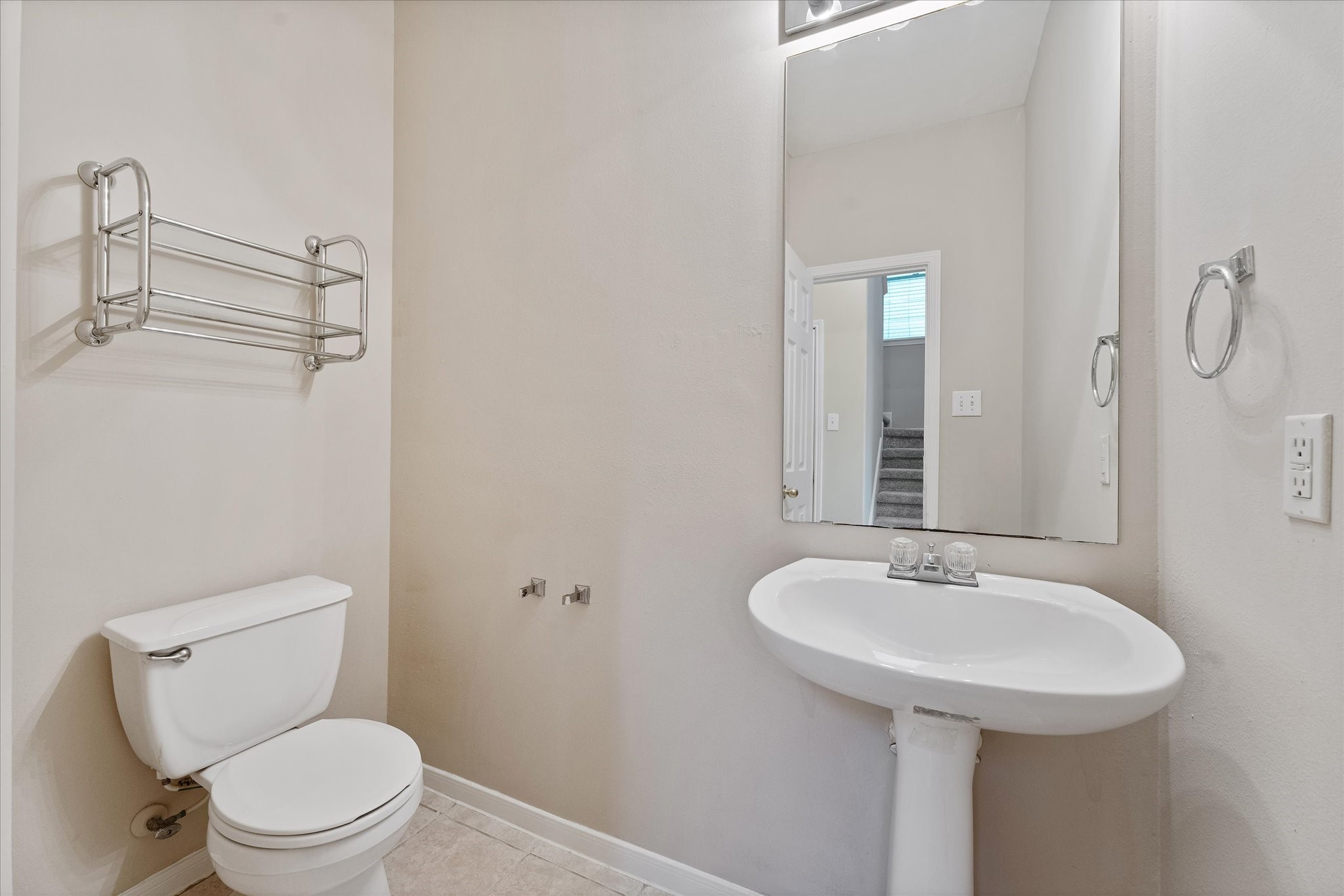 23806 Spring Way Drive Spring, TX 77373 - Photo 9 of 44 a bathroom with a sink a toilet and shower