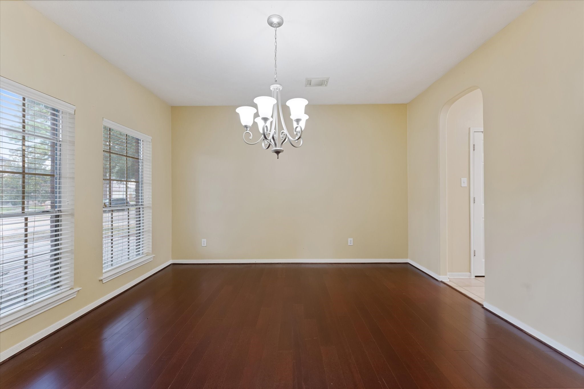 23806 Spring Way Drive Spring, TX 77373 - Photo 10 of 44 a view of wooden floor and windows in a room