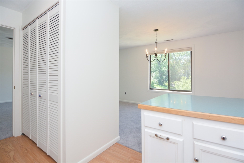 8 Concord Greene, Unit 4 Concord, MA 01742 - Photo 20 of 42 a view of hallway with window and entryway