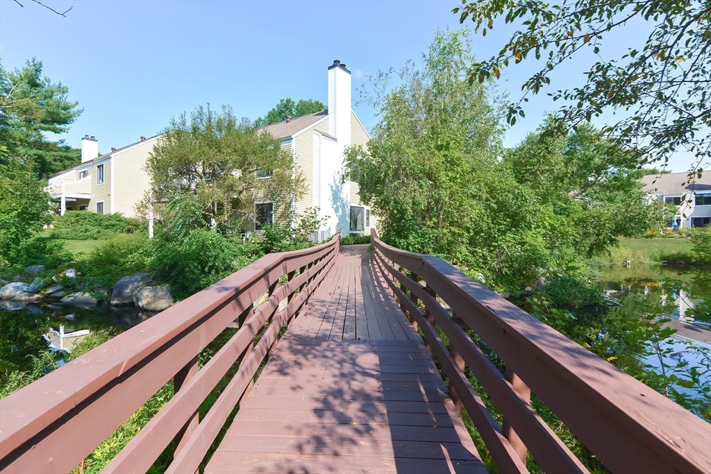 8 Concord Greene, Unit 4 Concord, MA 01742 - Photo 30 of 42 a view of balcony and yard