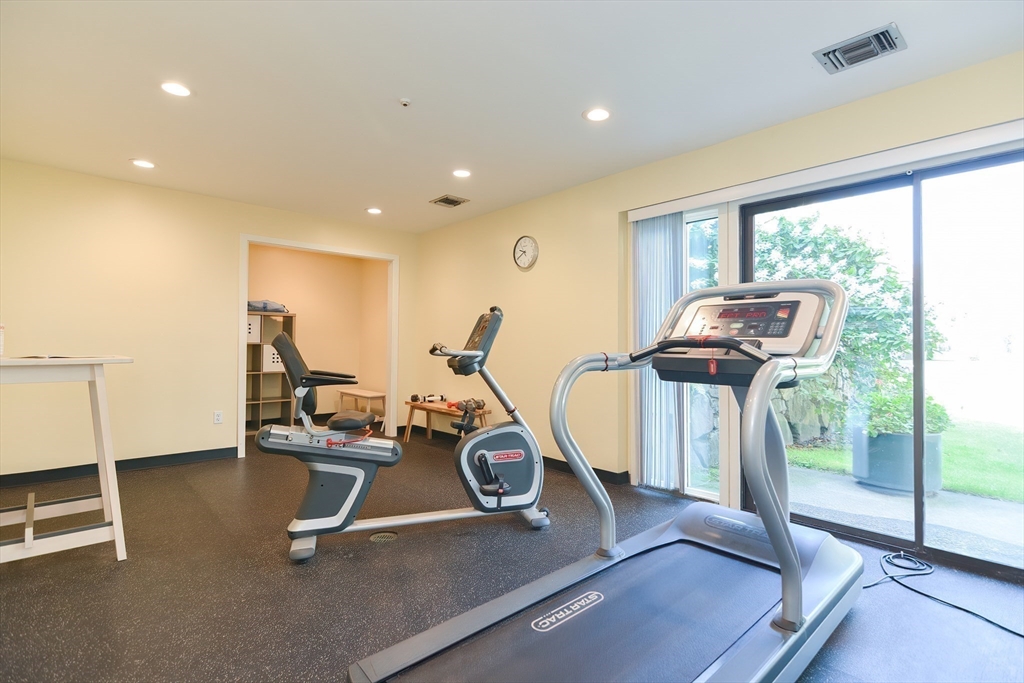 8 Concord Greene, Unit 4 Concord, MA 01742 - Photo 34 of 42 a view of a room with gym equipment