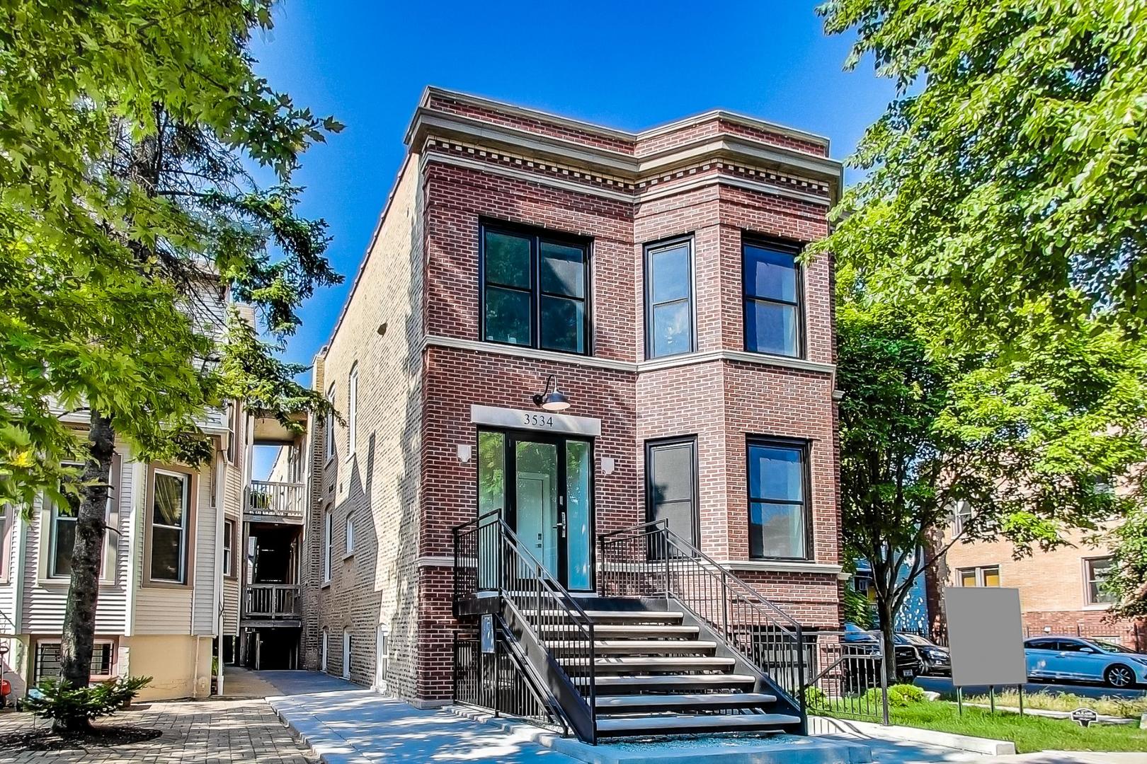 3534 West Wrightwood Avenue, Unit 1F Chicago, IL 60647 - Photo 1 of 18 a front view of a house