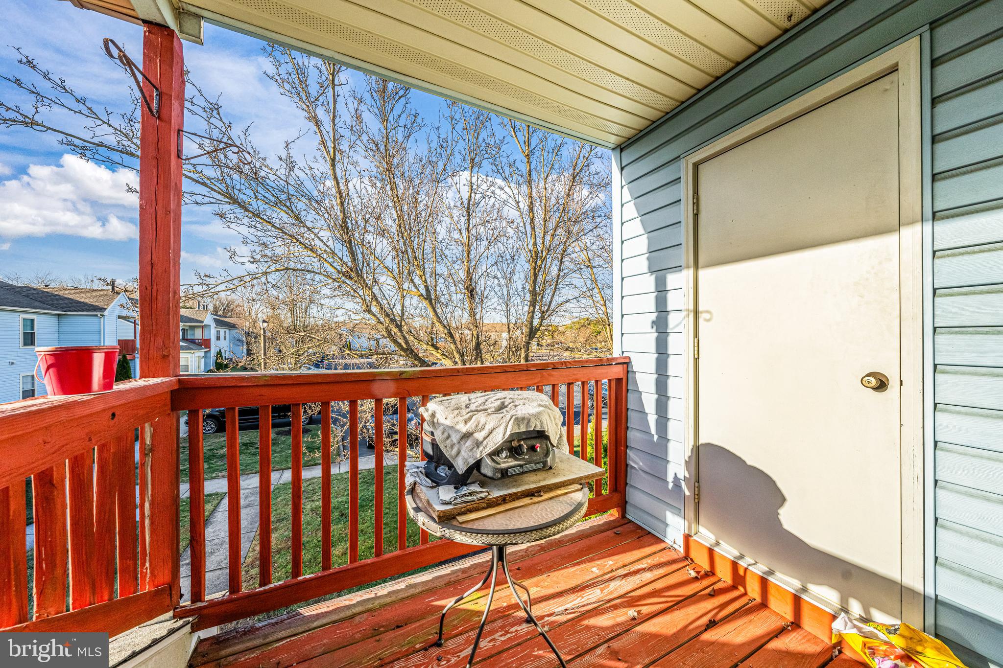 656 Covington Court Sewell, NJ 08080 - Photo 13 of 26 a view of a porch with wooden floor