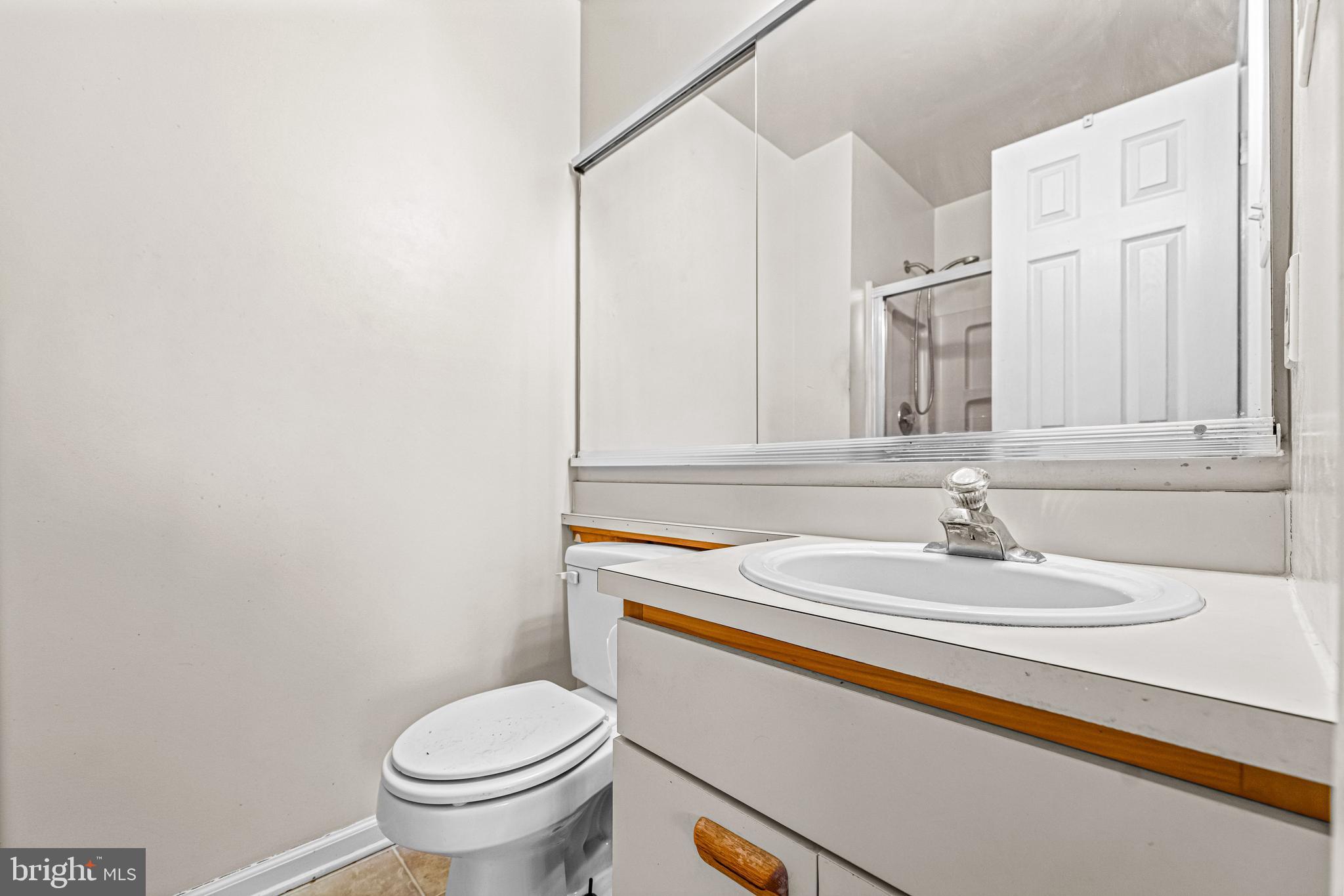 656 Covington Court Sewell, NJ 08080 - Photo 22 of 26 a bathroom with a sink and a toilet