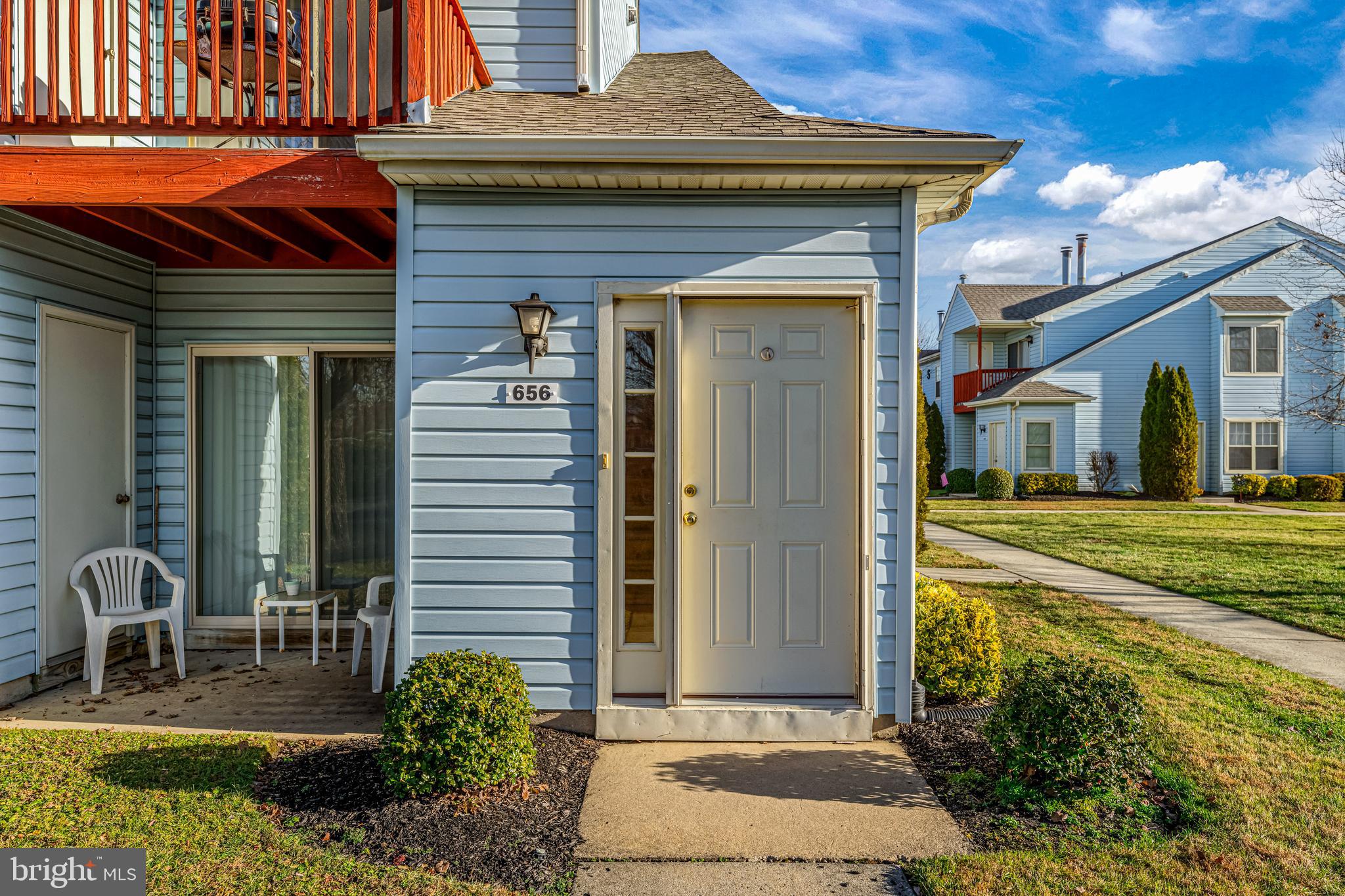 656 Covington Court Sewell, NJ 08080 - Photo 3 of 26 a front view of a house with garden