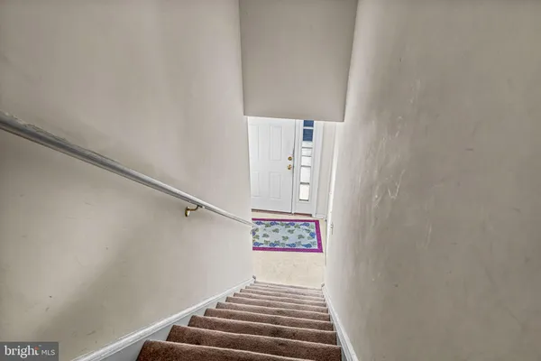 a view of entryway with stairs
